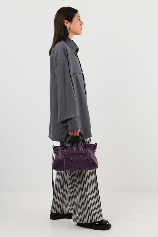 Balenciaga – Sac City en cuir violet
